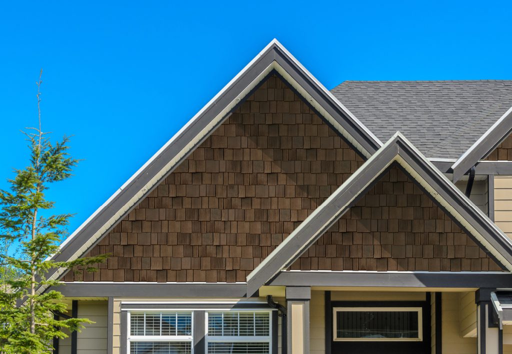 Home clad in Beach House Shake Ballard Brown composite shingles